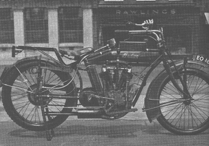The Indian, from the USA, with 680 cc twin engine, front and rear leaf springing, two-speed gearbox and foot clutch. This example dates from about 1915.